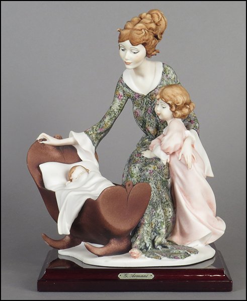 GIUSEPPE ARMANI 'MOTHER AND CHILDREN' FIGURAL GROUP.: GIUSEPPE ARMANI 'MOTHER AND CHILDREN' FIGURAL GROUP. Signed on the sculpture. Copyright Florence 1996. Bearing the Capodimonte 'N' crown stamp. Raised on a wood base (.75'' x 7'' x 7''). With original