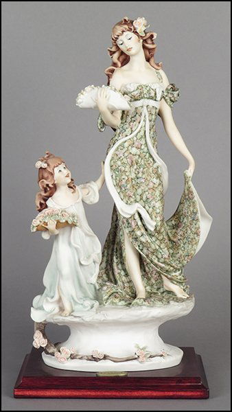 GIUSEPPE ARMANI 'ROSEBUDS WITH MY LITTLE SISTER': GIUSEPPE ARMANI 'ROSEBUDS WITH MY LITTLE SISTER' FIGURE. Signed on the sculpture. Copyright Florence 1995. Bearing the Capodimonte 'N' crown stamp. Raised on a wood base (1'' x 7.75'' x 6.25''). With