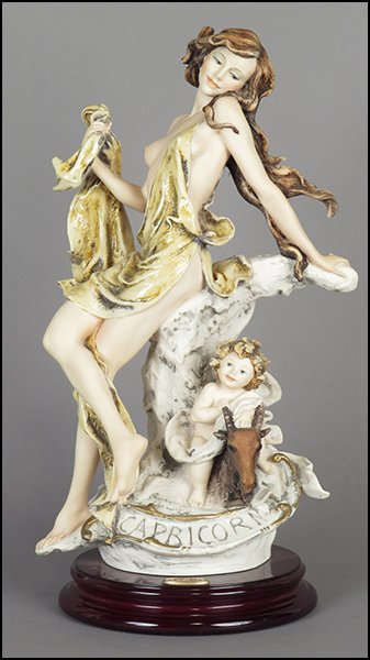 GIUSEPPE ARMANI 'CAPRICORN' FIGURE.: GIUSEPPE ARMANI 'CAPRICORN' FIGURE. From the Zodiac series. Signed on the sculpture. Edition no. 979/5000. Copyright Florence 1997. Bearing the Capodimonte 'N' crown stamp. Raised on a wood base (H: 1