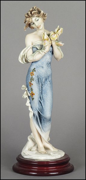 GIUSEPPE ARMANI 'IRIS' FIGURE.: GIUSEPPE ARMANI 'IRIS' FIGURE. From the Member's Society 1995 Event series. Signed on the sculpture. Copyright Florence 1994. Bearing the Capodimonte 'N' crown stamp. Raised on a wood base (H: 1.25''