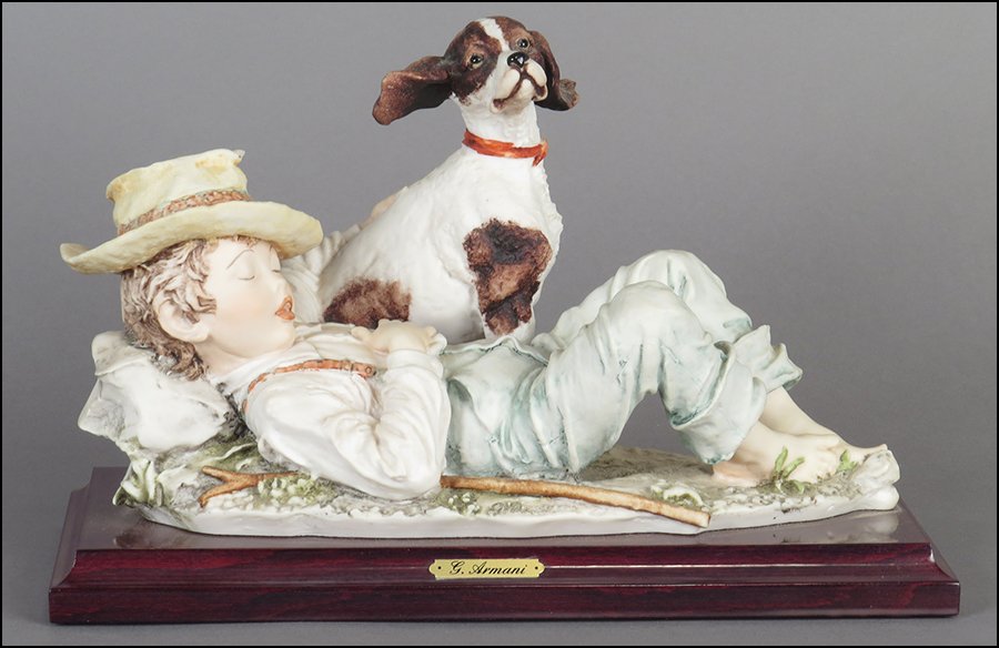 GIUSEPPE ARMANI 'PALS' FIGURAL GROUP.: GIUSEPPE ARMANI 'PALS' FIGURAL GROUP. Depicting a boy and his dog. Signed on the sculpture. Bearing the Capodimonte 'N' crown stamp. Raised on a wood base (.75'' x 10.5'' x 5.25'') Figural group H: 5.