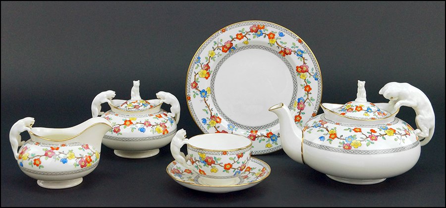 SPODE COPELAND TEA SET BEARING FIGURAL HANDLES: SPODE COPELAND TEA SET BEARING FIGURAL HANDLES DEPICTING CATS. Eighteen floral patterned pieces including five plates, five cups, five saucers, a teapot, a creamer, and a sugar with lid. Bearing gilt 