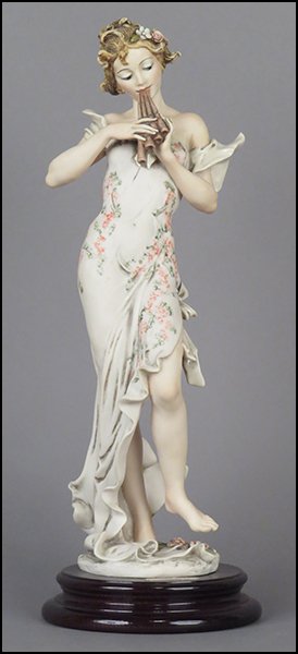 GIUSEPPE ARMANI 'MELODY' FIGURE.: GIUSEPPE ARMANI 'MELODY' FIGURE. Signed on the sculpture. From the Member's Society 1995 Redemption series. Copyright Florence 1994. Bearing the Capodimonte 'N' crown stamp. Raised on a wood base (H: