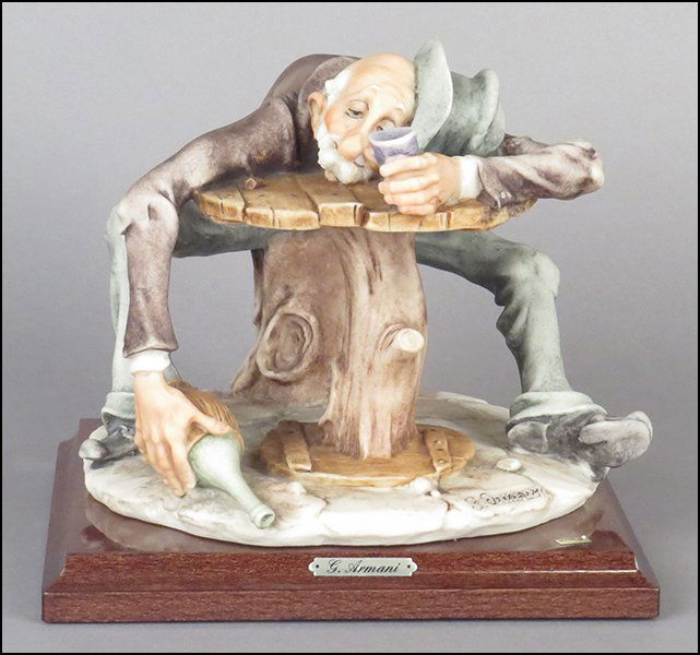GIUSEPPE ARMANI 'RICHARD'S NIGHT OUT' FIGURE.: GIUSEPPE ARMANI 'RICHARD'S NIGHT OUT' FIGURE. Signed on the sculpture. Bearing the Capodimonte 'N' crown stamp. Raised on a wood base (1'' x 7'' x 7''). With original foam Figure H: 6''