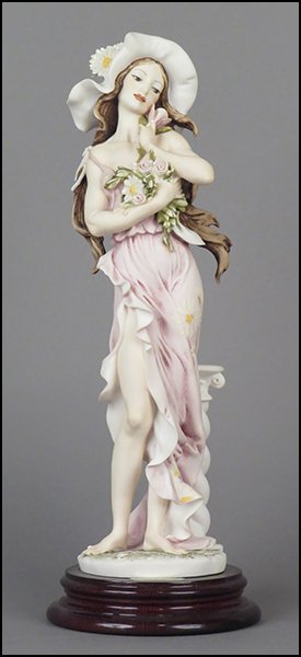 GIUSEPPE ARMANI 'DAISY' FIGURE.: GIUSEPPE ARMANI 'DAISY' FIGURE. Signed on the sculpture. From the Member's Society 1994 Events series. Copyright Florence 1993. Bearing the Capodimonte 'N' crown stamp. Raised on a wood base (H: 1.25'