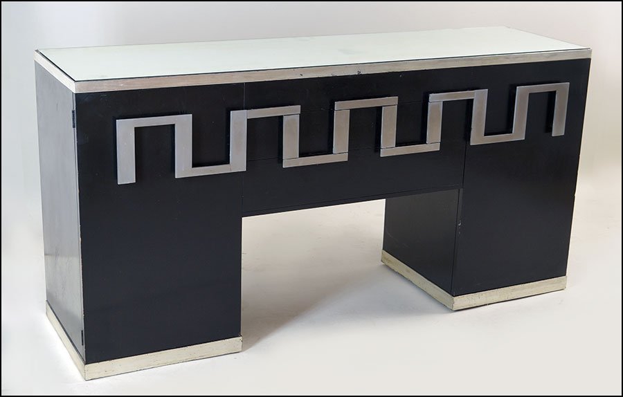 CONTEMPORARY PAINTED WOOD SIDEBOARD.: CONTEMPORARY PAINTED WOOD SIDEBOARD. Black with silver painted accents. Bearing two drawers in the center and two cabinets on either side. Unlabeled. With a mirrored glass top 36'' x 72'' x 20''