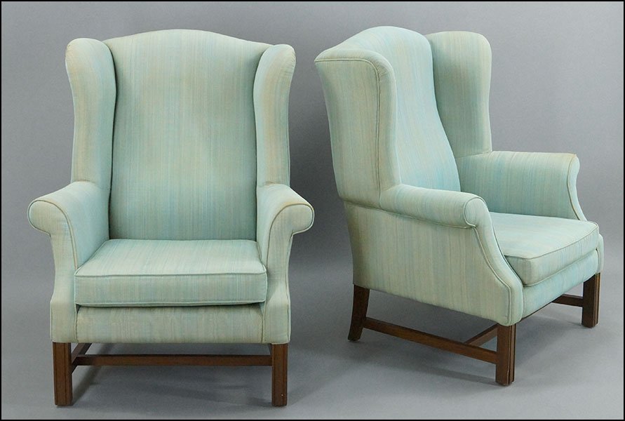 PAIR OF UPHOLSTERED WINGBACK ARMCHAIRS.: PAIR OF UPHOLSTERED WINGBACK ARMCHAIRS. Bearing straight legs Each: 43" x 34" x 26"