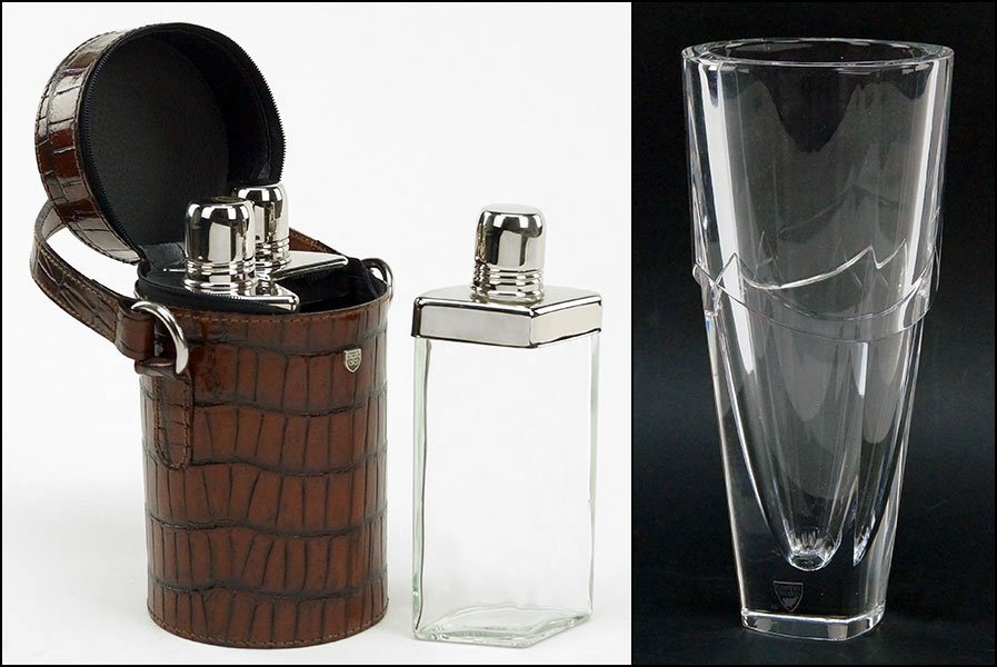GERMAN TRAVELING FLASK SET.: GERMAN TRAVELING FLASK SET. Comprised of a handled faux reptile skin leather carrying case, with three triangle form glass and stainless steel flasks inside. Together with an Orrefors Sweden crystal v