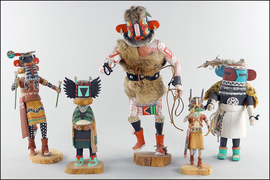 COLLECTION OF KACHINA DOLLS.: COLLECTION OF KACHINA DOLLS. Comprised of 'He He Ya' by Tim Youvella, 'Snakeface Whipper' and 'Badger' by R. Duwyenie, 'Crow Mother Tewa' by Larry David, and one unsigned, unlabeled kachina Tallest H: