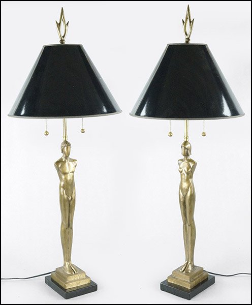 A PAIR OF TOM CORBIN PATINATED BRONZE TABLE LAMPS.: A PAIR OF TOM CORBIN PATINATED BRONZE TABLE LAMPS. Bronze height: 19.5" $1,000/$1,500 Depicting a nude man and woman. Each figure is signed "Corbin" along the bronze base. Raised on 1" marble bases