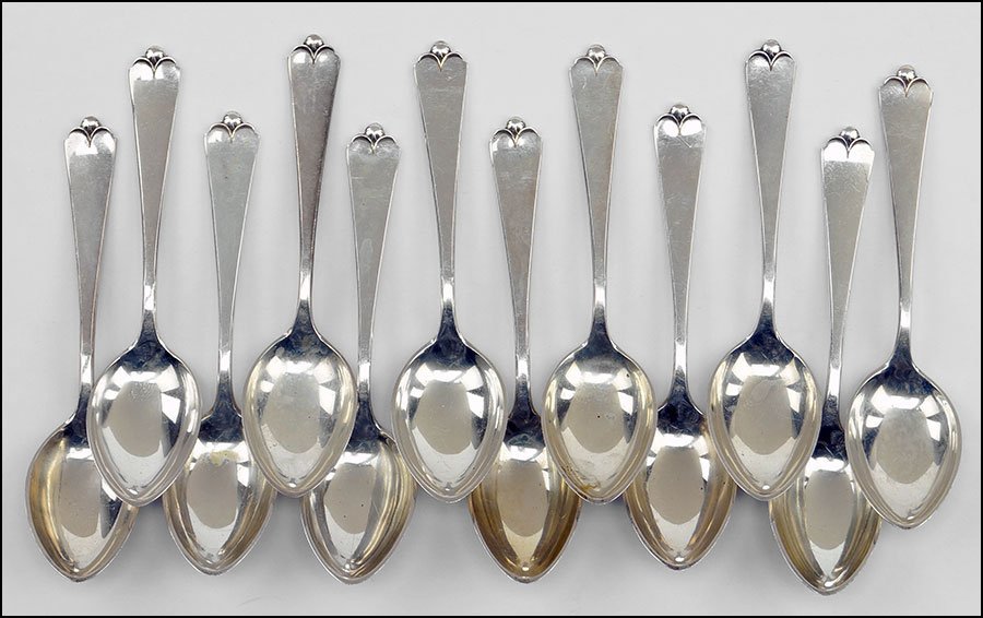 A SET OF TWELVE WATSON STERLING SILVER DEMITASSE: A SET OF TWELVE WATSON STERLING SILVER DEMITASSE SPOONS. 6.10 ozt $100/$200 In the Lotus pattern