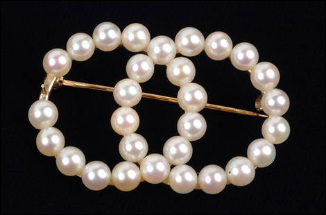 A CULTURED PEARL AND 14 KARAT YELLOW GOLD INTERLOCKING: A CULTURED PEARL AND 14 KARAT YELLOW GOLD INTERLOCKING CIRCLE BROOCH. Wt: 5.9 grams Length: 1.5" $200/$300 Pearls are approximately 4mm. Brooch is missing one pearl