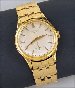 A PATEK PHILIPPE CALATRAVA MEN'S 18 KARAT YELLOW GOLD