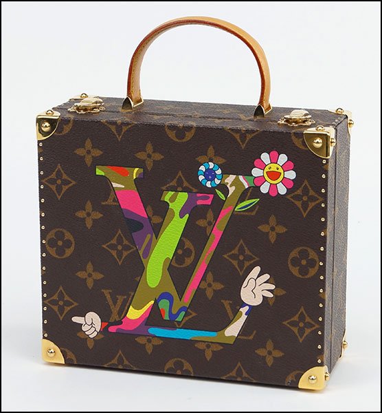 LOUIS VUITTON LIMITED EDITION TAKASHI MURAKAMI JEWELRY: LOUIS VUITTON LIMITED EDITION TAKASHI MURAKAMI JEWELRY BOX. 6.75'' x 7.75'' x 2.75'' $1,500/$2,000 Circa 2003. Lined in alcantara. Featuring one leather handle, two clasp hinges, two interior jewelry