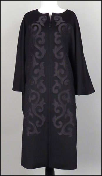 ESCADA BLACK CASHMERE AND WOOL BLEND ZIP-FRONT CAPE.: ESCADA BLACK CASHMERE AND WOOL BLEND ZIP-FRONT CAPE. Size: Large $100/$200 Bearing silk lining. Provenance: From the Estate of Frances R. Dittmer