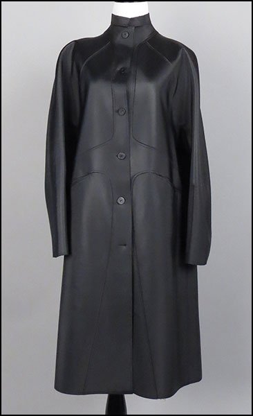 CHADO RALPH RUCCI BLACK LEATHER AND CASHMERE SWING: CHADO RALPH RUCCI BLACK LEATHER AND CASHMERE SWING JACKET. Size: Large $300/$500 Mid-calf length. Cashmere lined. Provenance: From the Estate of Frances R. Dittmer