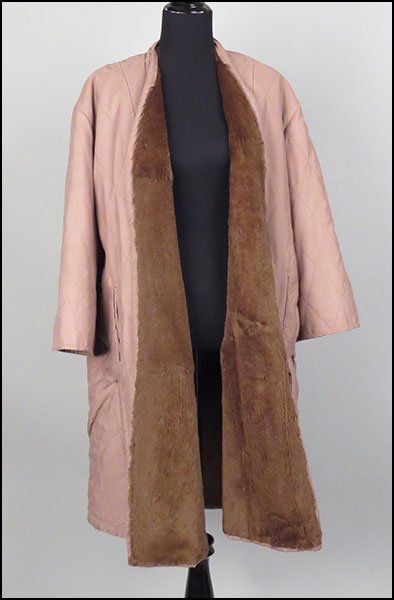 GIANFRANCO FERRE FOR ULTIMO REVERSIBLE COAT. Size: GIANFRANCO FERRE FOR ULTIMO REVERSIBLE COAT. Size unlabeled $200/$400 Bearing nutria on one side and quilted canvas on the other