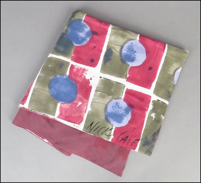 A NICK CAVE PAINTED SILK SCARF. 82" x 21" $100/$200: A NICK CAVE PAINTED SILK SCARF. 82" x 21" $100/$200 Reversible from a geometric design to a solid. Signed "Nick Cave"