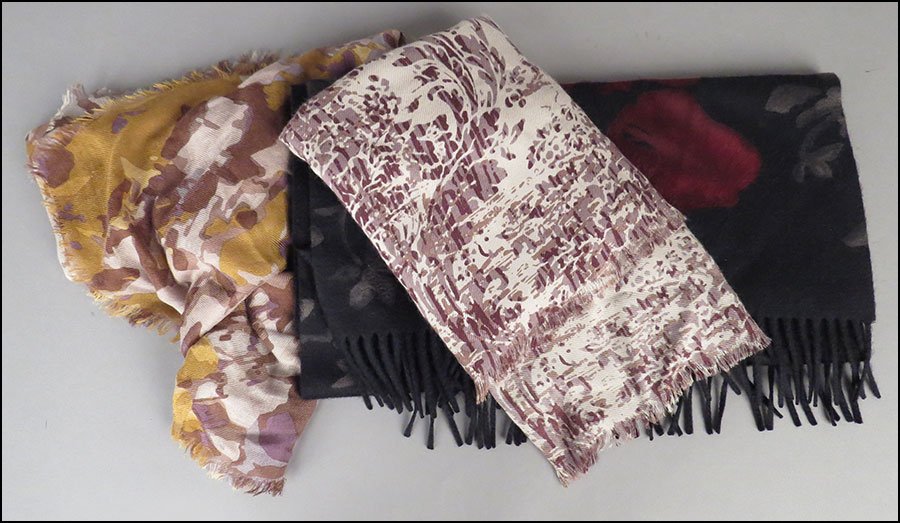GROUP OF THREE CASHMERE BLEND SCARVES. $75/$125 Bearing: GROUP OF THREE CASHMERE BLEND SCARVES. $75/$125 Bearing various prints. All unlabeled. Provenance: From the Estate of Frances R. Dittmer