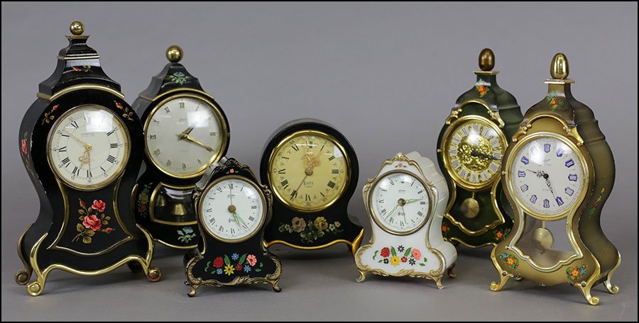 COLLECTION OF MINIATURE DESK CLOCKS.: COLLECTION OF MINIATURE DESK CLOCKS. Consisting of Looping, Schmid, Koch, Schatz, Linden and Westclox Tallest: 9" x 5"