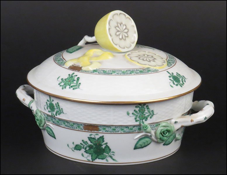 A HEREND PORCELAIN 'CHINESE BOUQUET' COVERED AND: A HEREND PORCELAIN 'CHINESE BOUQUET' COVERED AND HANDLED TUREEN. Bearing gilt painted embellishments. With a lemon form finial and applied rose design. Green in color. Stamped beneath. Hand-painted H: