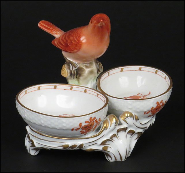 A HEREND PORCELAIN 'CHINESE BOUQUET' TWIN SALT DISH.: A HEREND PORCELAIN 'CHINESE BOUQUET' TWIN SALT DISH. Bearing gilt painted embellishment. Rust in color. With a bird form perched in between the joint salt cellars. Hand-painted. Stamped beneath 4.25''