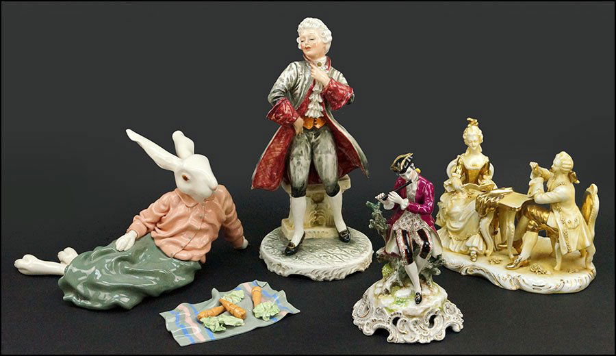 GROUP OF PORCELAIN DECORATIVE FIGURES.: GROUP OF PORCELAIN DECORATIVE FIGURES. Comprised of a Capodimonte figure of a man playing a lute, a gilded figural group, a German royal figure stamped beneath, and a rabbit by Ken Ward, Santa Fe, dat
