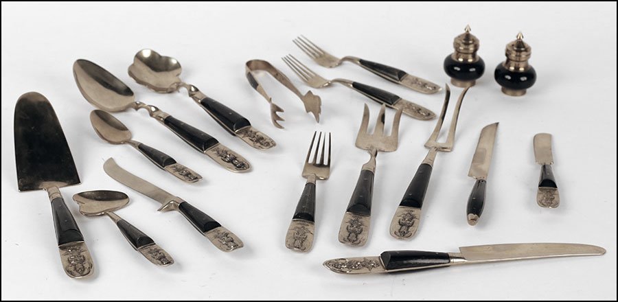A SIAM FLATWARE SET.: A SIAM FLATWARE SET. Comprised of forks, spoons, and knives. With serving utensils. Flatware bears a Buddha figure seated in a lotus position with the mark 'Siam'