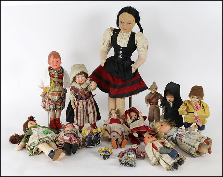 COLLECTION OF PAPIER-MACHE HEAD DOLLS.: COLLECTION OF PAPIER-MACHE HEAD DOLLS. Including dolls from the Slovakia, the Czech Republic, and other countries. Most with original clothes. Several with bisque painted heads. Provenance: Kellar and