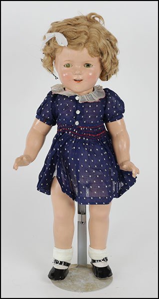 AN IDEAL SHIRLEY TEMPLE COMPOSITION DOLL.: AN IDEAL SHIRLEY TEMPLE COMPOSITION DOLL. Full compo body. With original clothes. Provenance: Kellar and Kellar Antiques, Oak Park H: 18.5''