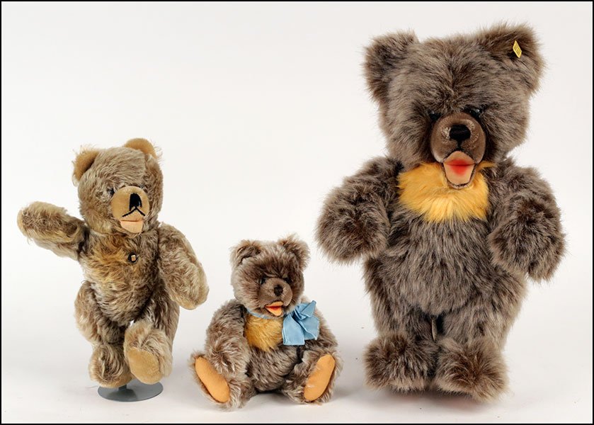 A GROUP OF THREE VINTAGE STEIFF ZOTTY TEDDY BEARS.: A GROUP OF THREE VINTAGE STEIFF ZOTTY TEDDY BEARS. One a 11'' 'Grisly,' the others: 9'' lacking tags and 16'' with an ear tag. All bear movable arms