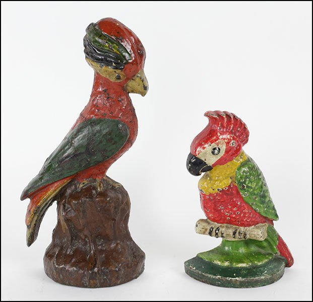 TWO POLYCHROME CAST IRON PARROT FORM DOORSTOPS.: TWO POLYCHROME CAST IRON PARROT FORM DOORSTOPS. Taller height: 11.5"