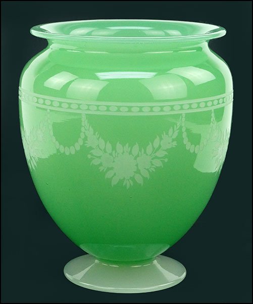 A STEUBEN JADE GREEN AND ALABASTER GLASS VASE.