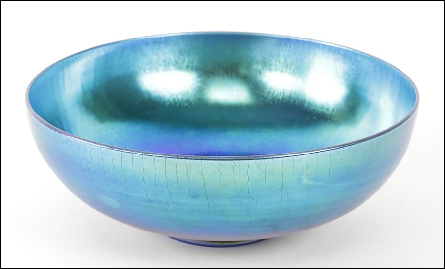 A STEUBEN BLUE AURENE GLASS BOWL.: A STEUBEN BLUE AURENE GLASS BOWL. Underside is etched "Aurene 2852" 3.5" x 9"