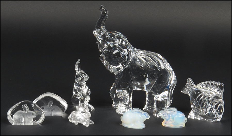 TWO SABINO OPALESCENT BUNNIES.: TWO SABINO OPALESCENT BUNNIES. Together with a Waterford elephant, a Waterford bunny, a Waterford fish, two Mats Johanson etched bunnies, and a rock crystal bunny Elephant height: 7"