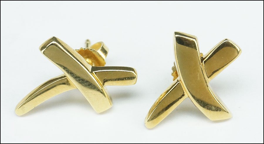 A PAIR OF PALOMA PICASSO FOR TIFFANY & CO 18 KARAT YELL: A PAIR OF PALOMA PICASSO FOR TIFFANY & CO 18 KARAT YELLOW GOLD EARRINGS. Designed as an "X". With original box Wt: 4.2 grams