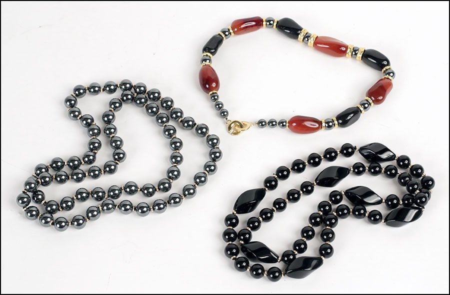 AN ONYX, CARNELIAN, AND HEMATITE NECKLACE.: AN ONYX, CARNELIAN, AND HEMATITE NECKLACE. Together with an onyx bead necklace and a hematite bead necklace. Provenance: From the Estate of Frances R. Dittmer Carnelian: 17"
