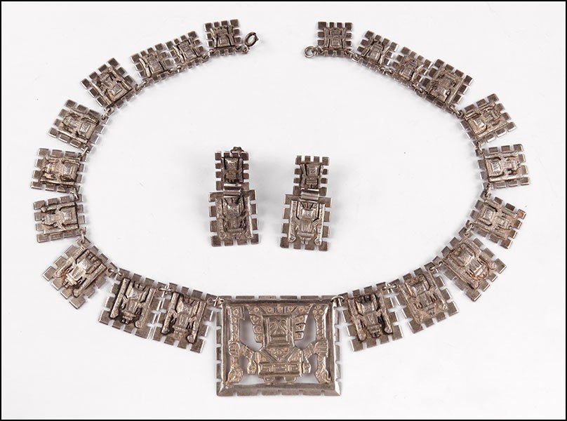 A STERLING SILVER NECKLACE.: A STERLING SILVER NECKLACE. Together with a coordinating pair of screwback earrings Necklace length: 15.5"