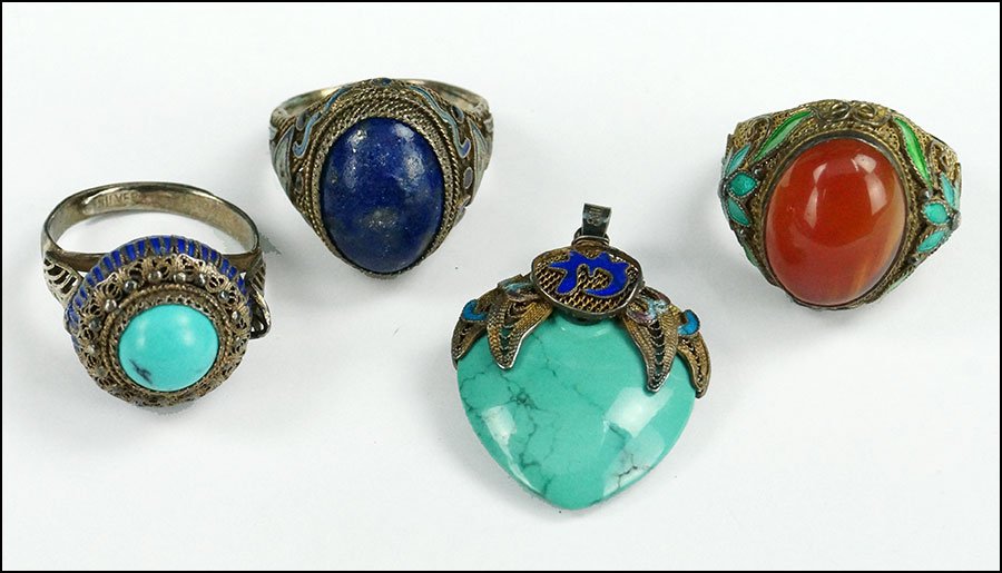 A CHINESE SILVER, CARNELIAN, AND ENAMEL RING.: A CHINESE SILVER, CARNELIAN, AND ENAMEL RING. Together with a Chinese silver, enamel, and lapis ring, a Chinese silver, enamel, and turquoise ring, and a Chinese enamel, silver, and turquoise heart fo