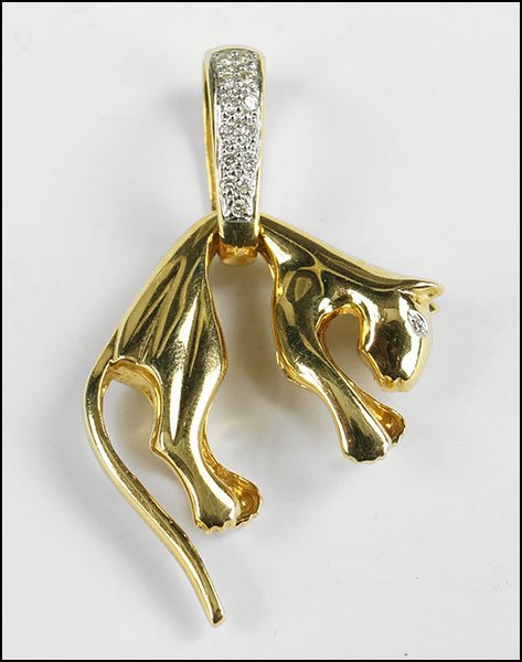 A DIAMOND AND 18 KARAT YELLOW GOLD PANTHER PENDANT.: A DIAMOND AND 18 KARAT YELLOW GOLD PANTHER PENDANT. Bail contains thirteen pave set diamonds. Head contains two bead set diamond eyes Wt: 15.6 grams