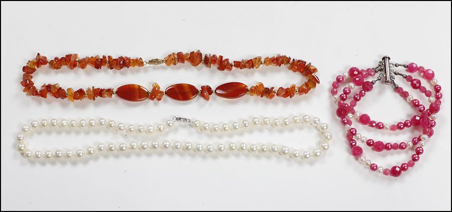 A CARNELIAN AND 18 KARAT YELLOW GOLD BEAD NECKLACE.: A CARNELIAN AND 18 KARAT YELLOW GOLD BEAD NECKLACE. Together with a pearl necklace with sterling silver clasp, and a semi-precious stone triple strand bracelet with sterling silver clasp Length: 17"