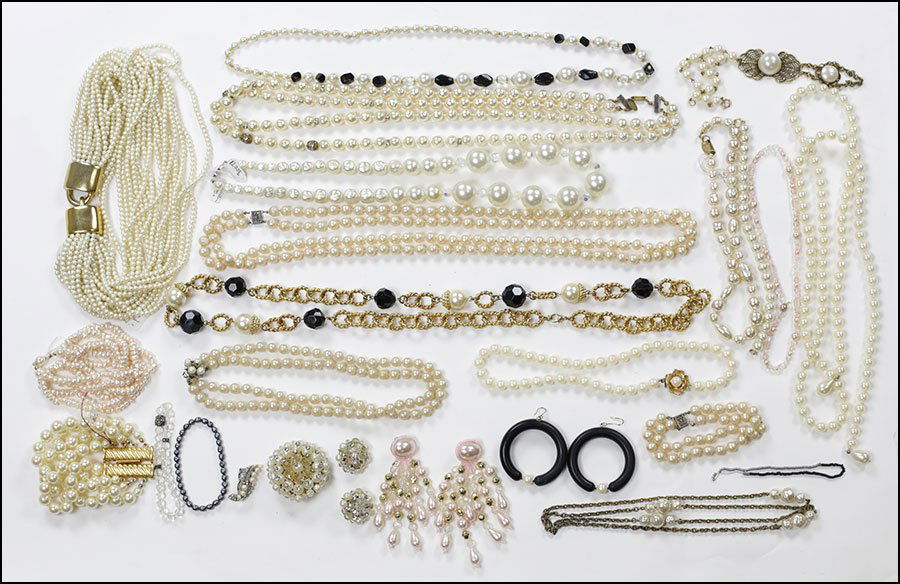 A COLLECTION OF FAUX PEARL JEWELRY.: A COLLECTION OF FAUX PEARL JEWELRY. Comprising necklaces, bracelets, post back earrings, earclips, and brooches, including two Miriam Haskell necklaces, one Carolee necklace and one Carolee bracelet