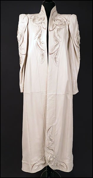 SHANNA FULL-LENGTH LEATHER JACKET.: SHANNA FULL-LENGTH LEATHER JACKET. Bearing ruched floral embellishments and shaping on the collar, front closure, and arms. Lined. Made in Israel Size 42