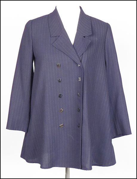 A KARL LAGERFELD WOOL BLEND PINSTRIPE BLAZER.: A KARL LAGERFELD WOOL BLEND PINSTRIPE BLAZER. Lined. Made in France. With geometric square shaped buttons Size 38