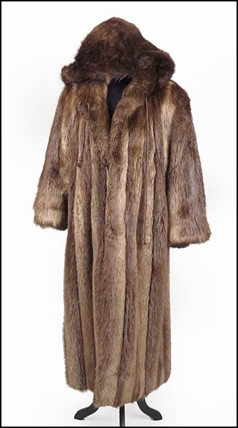A FULL LENGTH NUTRIA COAT.: A FULL LENGTH NUTRIA COAT. Made in Canada, with a removable hood and cinch cuffs Size: 10