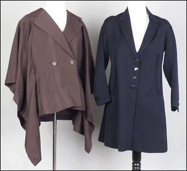 AN ISSEY MIYAKE FOR BERGDORF GOODMAN COTTON AND WOOL BL: AN ISSEY MIYAKE FOR BERGDORF GOODMAN COTTON AND WOOL BLEND CAPE JACKET. With two buttons in the front. Bearing a vest bodice with draped sleeves. Together with a Gimbel Brothers lined wool waistcoat (