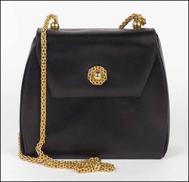 A PALOMA PICASSO BLACK LEATHER HANDBAG.: A PALOMA PICASSO BLACK LEATHER HANDBAG. Bearing gold tone accents 8'' x 9'' x 2.75''