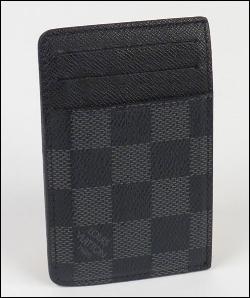 A LOUIS VUITTON DAMIER GRAPHITE CARD HOLDER.: A LOUIS VUITTON DAMIER GRAPHITE CARD HOLDER. Monogrammed canvas and leather. Made in France, Date code TH 3088. With original box 2.75" x 4.25"