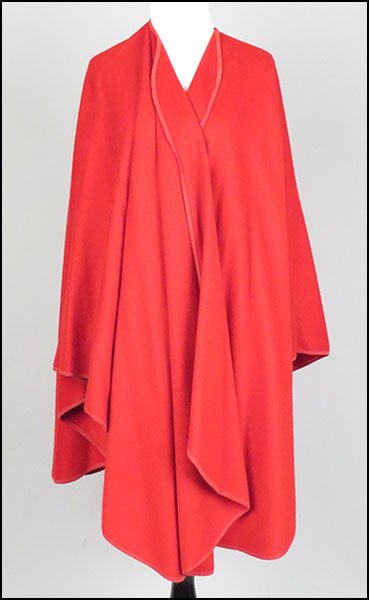 A LORO PIANA FOR NEIMAN MARCUS RED CASHMERE SHAWL.: A LORO PIANA FOR NEIMAN MARCUS RED CASHMERE SHAWL. From Italy. Provenance: From the Estate of Frances R. Dittmer No size