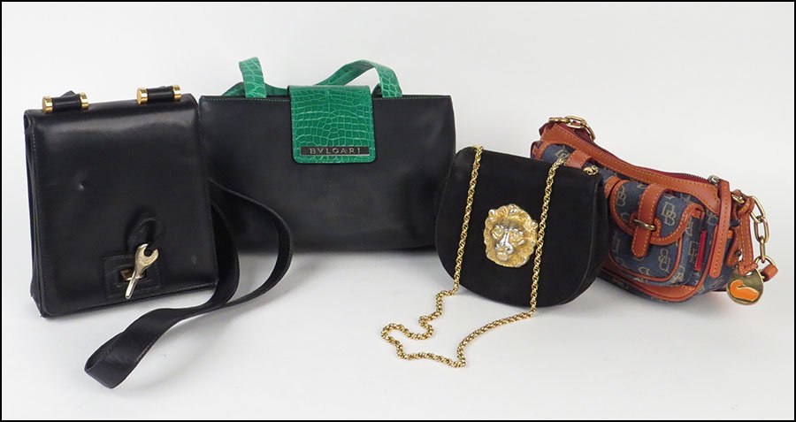 GROUP OF FOUR HANDBAGS.: GROUP OF FOUR HANDBAGS. Comprised of one by Bvlgari, a Dooney & Burke signature logo bag, a Donna Karan black leather bag, and a Morris Moskowitz black suede bag with a lion figure on the front